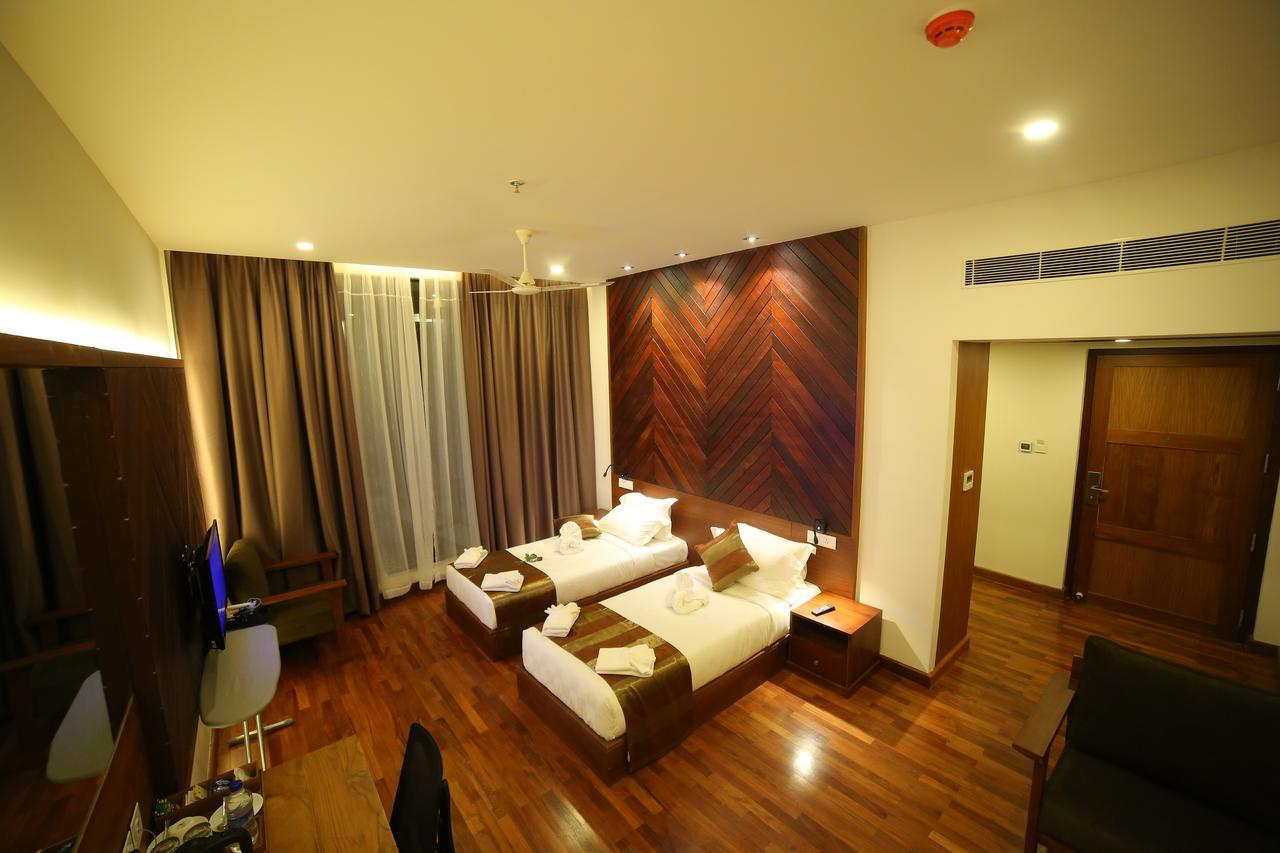 Woodies Bleisure Hotel Calecute Exterior foto